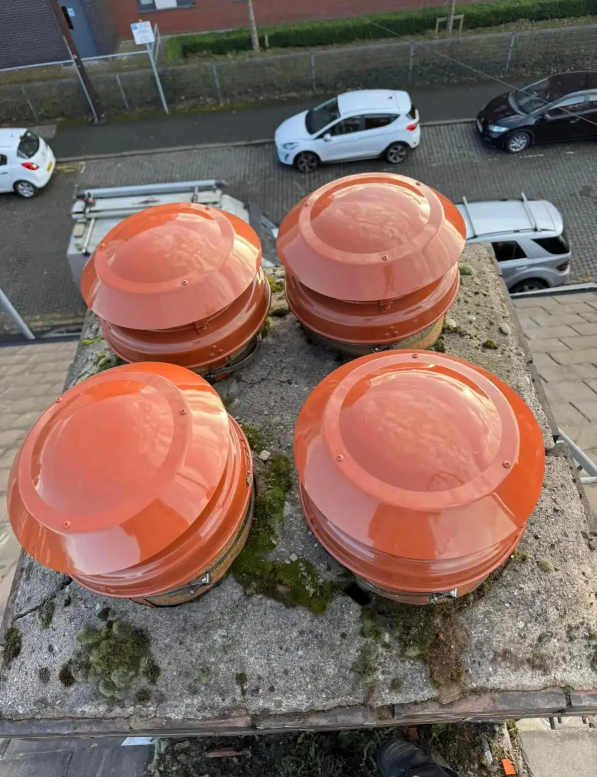 A chimney stack: cowls fitted