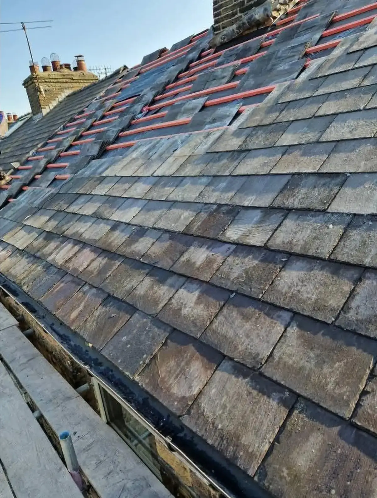 A slate roof: slates going on